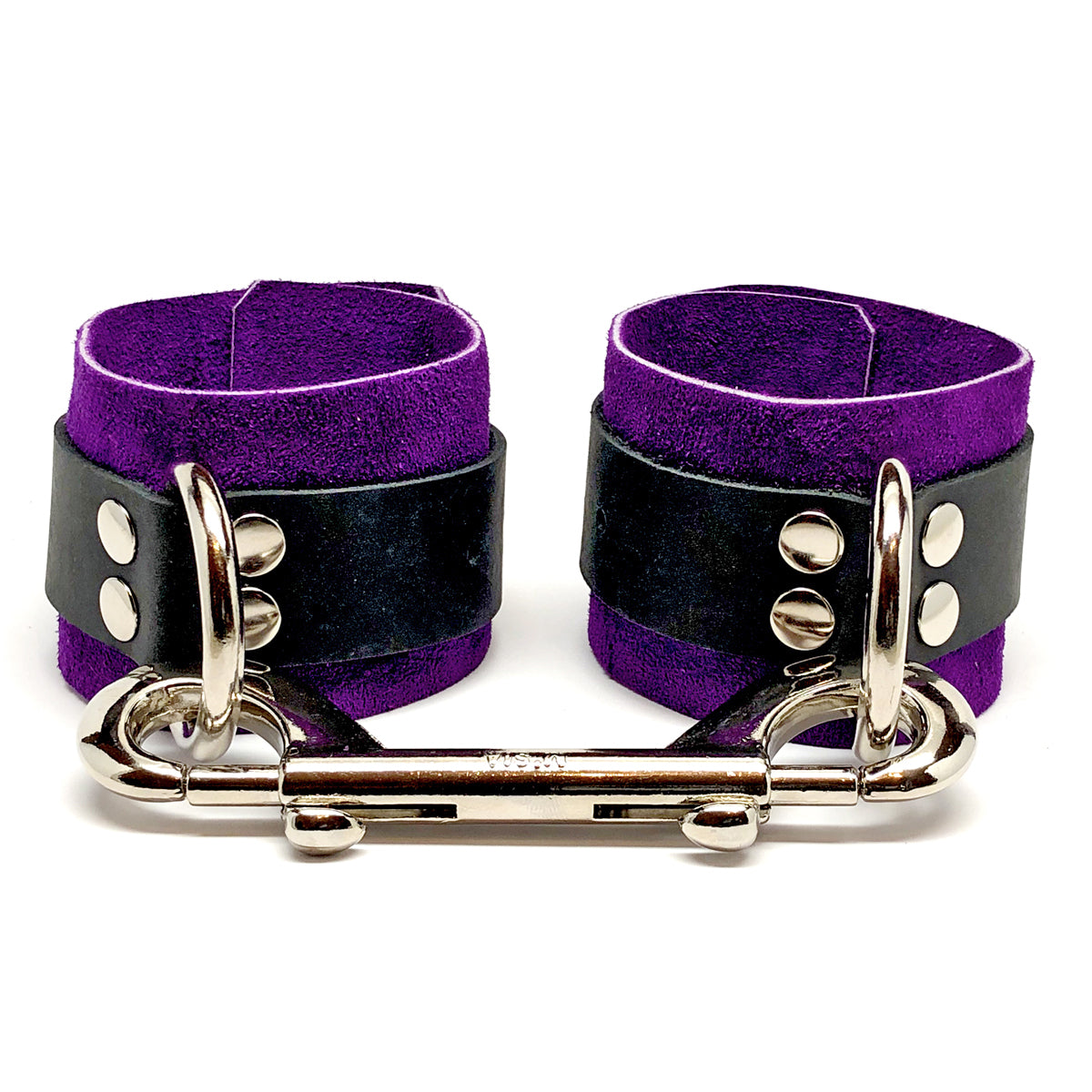 For bondage play that’s rough on the outside and soft on the inside, nothing works better than these handmade, suede-lined, leather wrist & ankle cuffs.