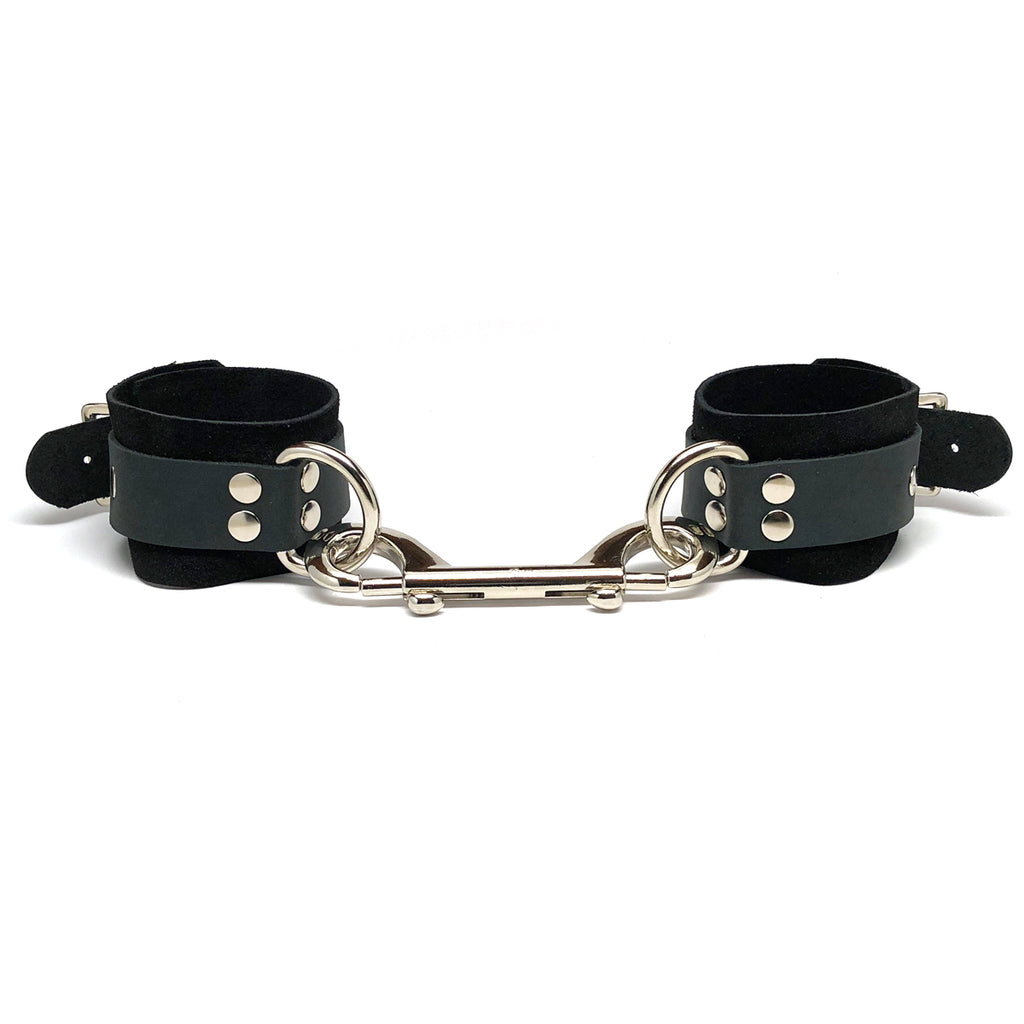 For bondage play that&rsquo;s rough on the outside and soft on the inside, nothing works better than these handmade, suede-lined, leather wrist & ankle cuffs.